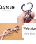 Close-up of 2 Pack Trigger Snap Hooks Heavy Duty 316 Stainless Steel With Swivel Eye Five Eighth Inch Wide Lobster Clasps in hand