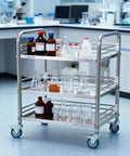 Sturdy Stainless Steel 3-Tier Rolling Cart With Lockable Wheels For Hospital Lab Clinic Kitchen Restaurant Salon Easy To Clean Medical Serving Trolley By VEVOR in lab setting.