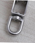 Close-up of 32mm Stainless Steel Single-Sheaved Pulley Roller Swivel Function Heavy Duty Wire Rope Pulley for Lifting Systems.