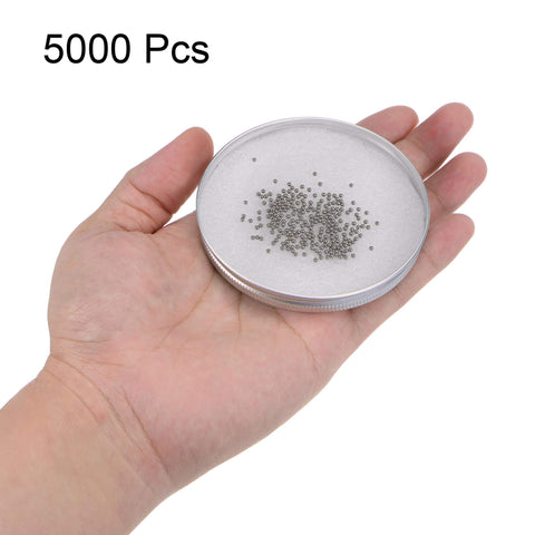 Hand holding 5000 Pro Grade 1.5mm Stainless Steel Bearing Balls G100 Precision, 304 Stainless Steel Micro Balls, Corrosion Resistant