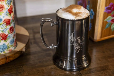 Classic Stainless Steel 20 Ounce Double Wall Beer Stein With Easy Grip Handle Vacuum Insulated Tankard Copper Finish with coffee foam.