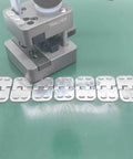 24 Inch Stainless Steel Conveyor Belt Fasteners With Hinge Pin Two Pairs in a box shown with installation tool on green surface