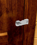 Ipetboom marine-grade stainless steel boat door latch with swivel padlock eye, mounted on wooden door (front view)