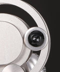 Close-up of Five Sixteenth By Eighteen Threads Per Inch Button Head Socket Cap Screw in stainless steel showing black hex drive