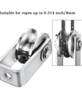 Dual-bearing cable pulley wheel set for rope systems, wall or ceiling mounted, shown in stainless steel, includes 2 pulleys