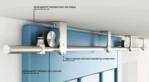 Stainless Steel Ceiling Mount Sliding Barn Door Hardware Kit For Doors One And Three Eighths To One And Three Quarters Inches Thick Supports Up To 198 Lb Includes Two Flat Rollers Two Stoppers Two 3.3 Foot Tracks Track Connector And Four Round Brackets installed on a blue door.