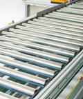 Two Pack 1.5 Inch Conveyor Roller Replacement Set For Gravity Transmission Systems installed on assembly line conveyor.