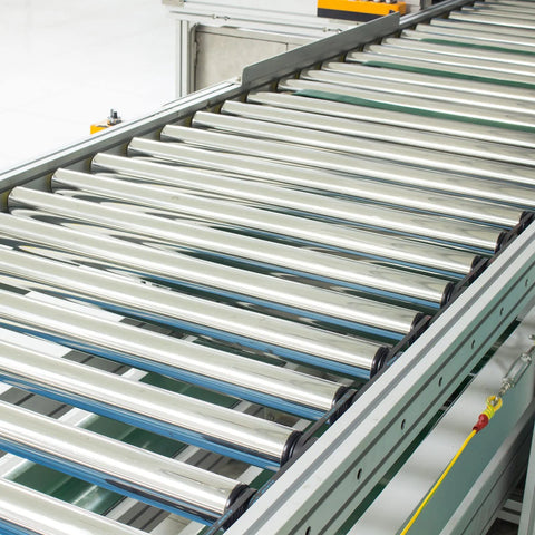Two Pack 1.5 Inch Conveyor Roller Replacement Set For Gravity Transmission Systems installed on assembly line conveyor.