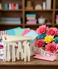 Stainless Steel Die Cutting Dies For Scrapbooking And Card Making on desk with colorful craft papers and artificial flowers