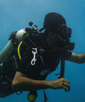 Front view of a 100mm stainless steel trigger snap clip attached to scuba gear.