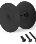 Premium stainless steel door hole cover plates guard entry doors, featuring two black plates with screws for security and privacy.