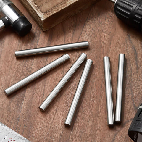 Heavy Duty Stainless Steel Dowel Pins Six Pack Three Eighths Inch Diameter By Three Inches 304 Grade on wooden surface