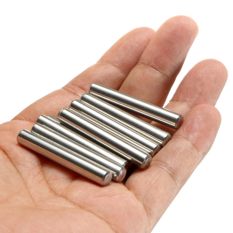Hand holding 24 Piece Dowel Pins 6 Mm By 40 Mm 304 Stainless Steel Pegs For Shelves And Furniture Support, silver tone, cylindrical pins