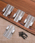 12 Pack Drywall Repair Clips 1/2 Inch Stainless Steel Patch Clips With 24 Screws for damaged walls DIY quick fix, laid out on wood