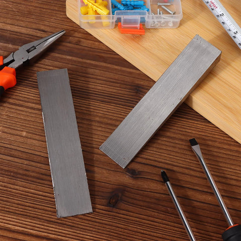 6 Piece Stainless Steel Flange Wedge Set For Lathe Machines 18x32x152mm Beveled on workbench with tools