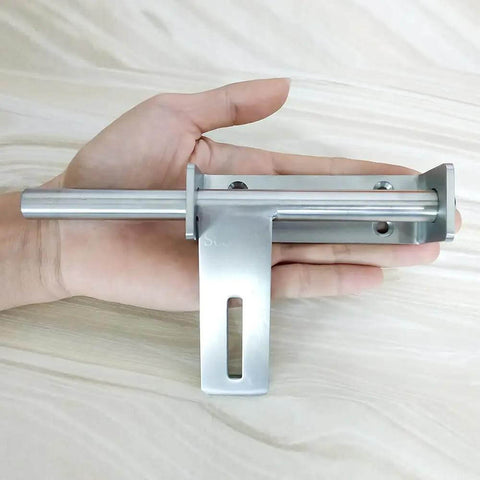 Hand holding Sliding Bolt Gate Latch with Padlock Hole Heavy Duty 304 Stainless Steel Barrel Door Latch Brushed Finish