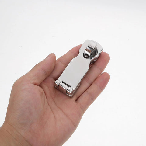 Front view of marine-grade stainless steel gate latch with swivel padlock eye, 75x25mm, held in hand