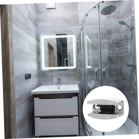 Experience a quiet, draft free doorway with an adjustable stainless steel swing stopper and glass fixing locator in a modern bathroom.