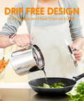Person pouring oil from Stainless Steel Grease Container With Fine Mesh Strainer 2L Bacon Fat Oil Jar Dust Proof Lid into pan