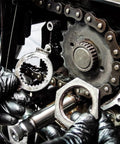 Mechanic using Internal Tooth Washers One Quarter Inch Stainless Steel Serrated Pack Of 100 in motorcycle chain assembly