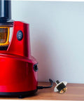 Stainless Steel Juicer Coupling Replacement Plug And Play Drive Connector beside red juicer for smooth operation