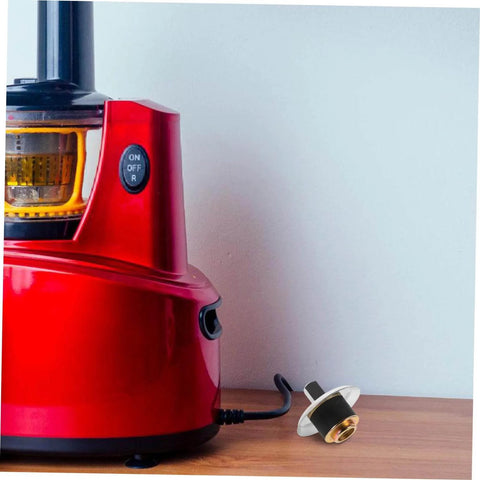 Stainless Steel Juicer Coupling Replacement Plug And Play Drive Connector beside red juicer for smooth operation