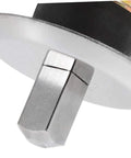 Close-up of a stainless steel juicer coupling replacement plug and play drive connector for various juicer models.