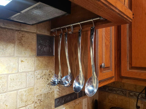Kitchen Utensil Rack 2 Pack, 15.6 Inch Pots and Pans Hanging Rack Wall Mounted with utensils in a kitchen setting