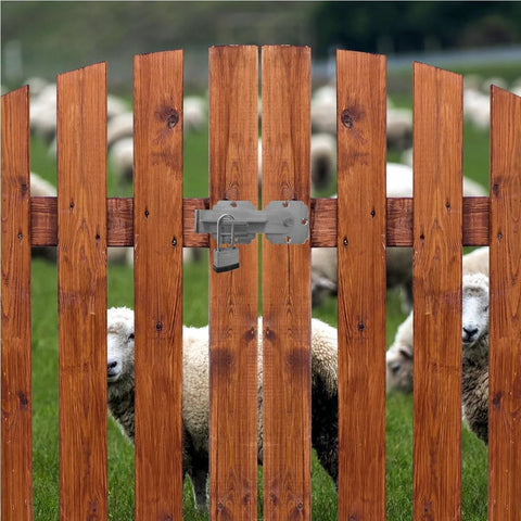 Flip Gate Latch With Padlock Hole Heavy Duty Stainless Steel Door Latch on wooden fence with sheep visible