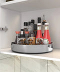 Stainless Steel Black Lazy Susan Turntable For Pantry Cabinet And Kitchen Storage 12 Inch Spice Rack Organizer holding bottles