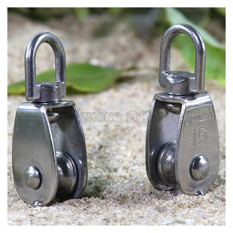 Two Stainless Steel Pulley M15 Single Wheel Swivel Lifting Rope Pulley Set Lifting Wheel Tools on sandy surface