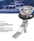 Close-up of stainless steel flush floor lock for marine hatch; chrome cam latch with spring-loaded mechanism