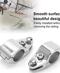 Close-up of two stainless steel hinged upper jaw slide fittings for yacht rail installation, 30mm