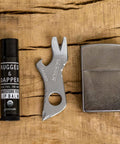 Shard 7 in 1 Keychain Multitool with bottle opener and screwdriver, lightweight stainless steel, shown with lip balm and lighter.