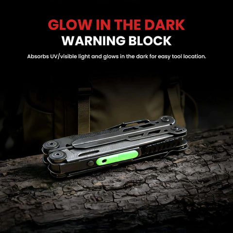 33-In-1 Stainless Steel Multitool with pliers, knife, saw, and glow strip on a log for outdoor survival, camping, and hiking