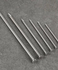 Six 304 stainless steel nails of varying lengths from 430 Pcs Stainless Steel 304 Nails Kit For Outdoor And Indoor Use With Mixed Lengths
