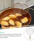 Fried food in pan with 1pc Stainless Steel Explosion-proof Oil Screen Cover Cooking Oil Filter Strainer Pan Cover shown in use.