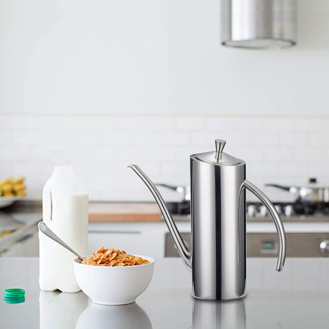 Premium Stainless Steel Olive Oil Dispenser For Precision Pouring And Pro Grade Kitchen Style Leakproof Cruet With Ergonomic One Piece Body Long Narrow Spout And Arc Handle 24 Ounce 700 Milliliters SUS304 18 10 Construction By KSENDALO in kitchen setting