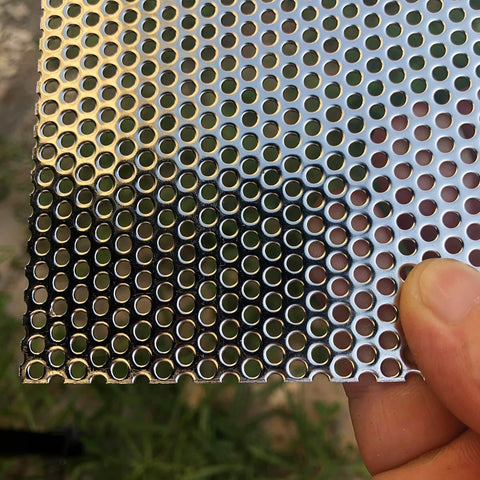 Pro Grade Heavy Duty 19 Gauge Stainless Steel Perforated Metal Sheet 304, 15.7 In x 7.8 In, 3 Mm Holes, held by hand.