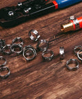 Three Quarters Inch PEX Cinch Clamp Rings in Premium 304 Stainless Steel Thickened Design for 360 Degree Watertight Seals displayed on table