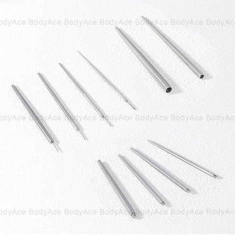 Set of stainless steel piercing tapers 14G, 16G, 18G, 20G with smooth edges for safe insertion into ears, nose, lips, and navel