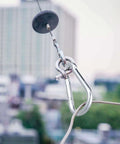 Close-up of Pulley Block System Set, M20 Pulley Wheel Stainless Steel with 66ft Nylon Rope and Hooks in outdoor setup