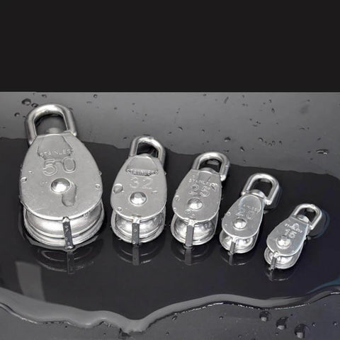 Stainless Steel Pulley Set with M32 Single Wheel Swivel, shown in multiple sizes on a wet surface