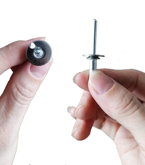 Hands holding 18-8 Stainless Steel Rivet Back-Up Washer for 1/8, 5/32, 3/16 Inch Rivets