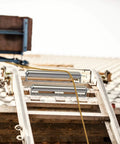 1.5" Diameter Stainless Steel Roller with Bracket Set, 11.8" BF Length, 2-Pack, installed on a ladder for smooth transport use