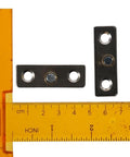 4 Pcs Stainless Steel Roller Guides For Sliding Barn Doors Floor Guides And Hardware Accessories with ruler for scale.