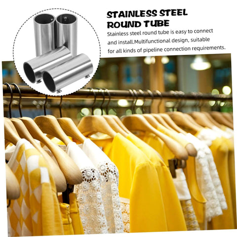 Display of stainless steel round tubes used for pipeline connection, with yellow and white clothes hanging on a wooden rail.