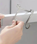 Two Pack Stainless Steel S Hooks No Drill Multipurpose Hanging Hooks For Kitchen Bedroom And Bathroom in use on cabinet