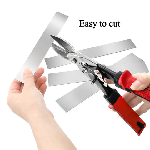 Person cutting Pro Grade 30 Piece Shim Stock Set In 304 Stainless Steel for kitchen and home projects, visible strips in hand