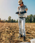 Person using Stainless Steel Soil Probe Rod 32 To 48 Inch Adjustable Ground Rod Tool With T Handle And Sharp Tip in a field